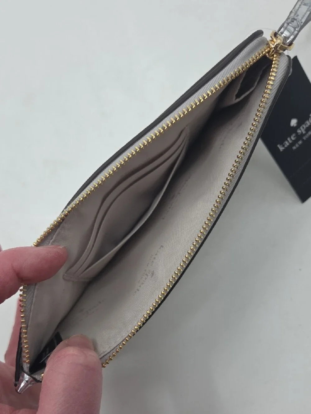 kate spade Metallic Silver Zip Wristlet